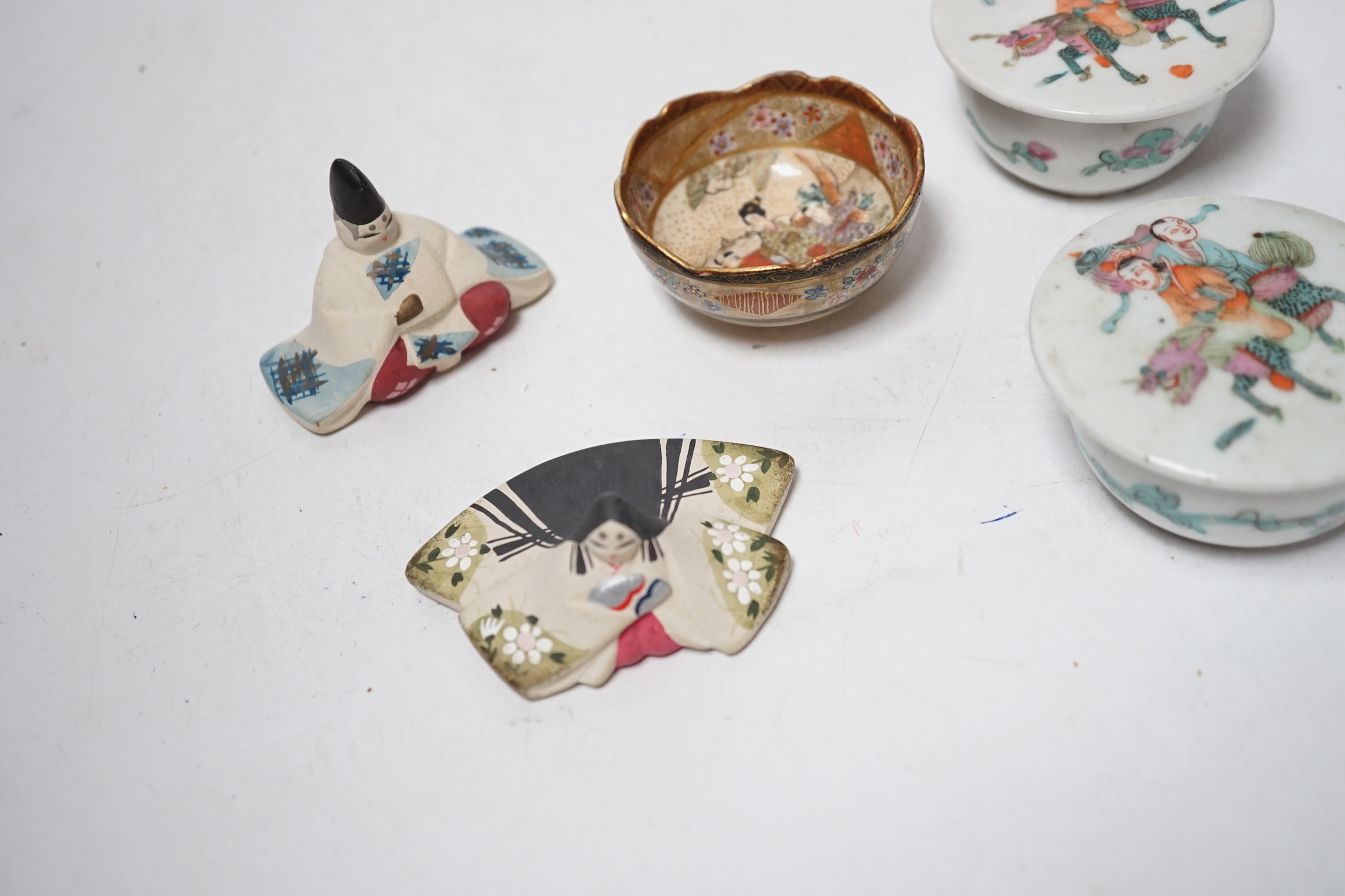 A pair of late 19th century Chinese famille rose jars and covers, Satsuma small bowl and two pottery models, 7cm wide
